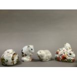 Four Royal Crown Derby paperweights including a dormouse, harvest mouse, a vole and a rabbit, all