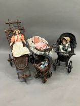 Three Victorian style prams of graduated size together with a Victorian style child's open chair and