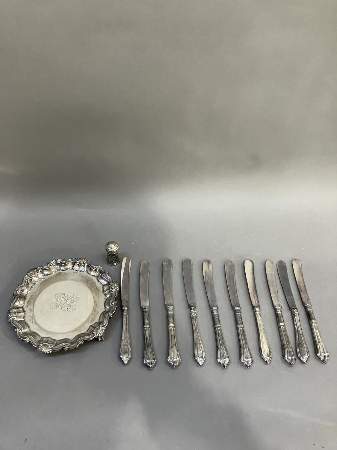 A Victorian silver waiter, circular outline with shell and c-scroll rim engraved to the centre