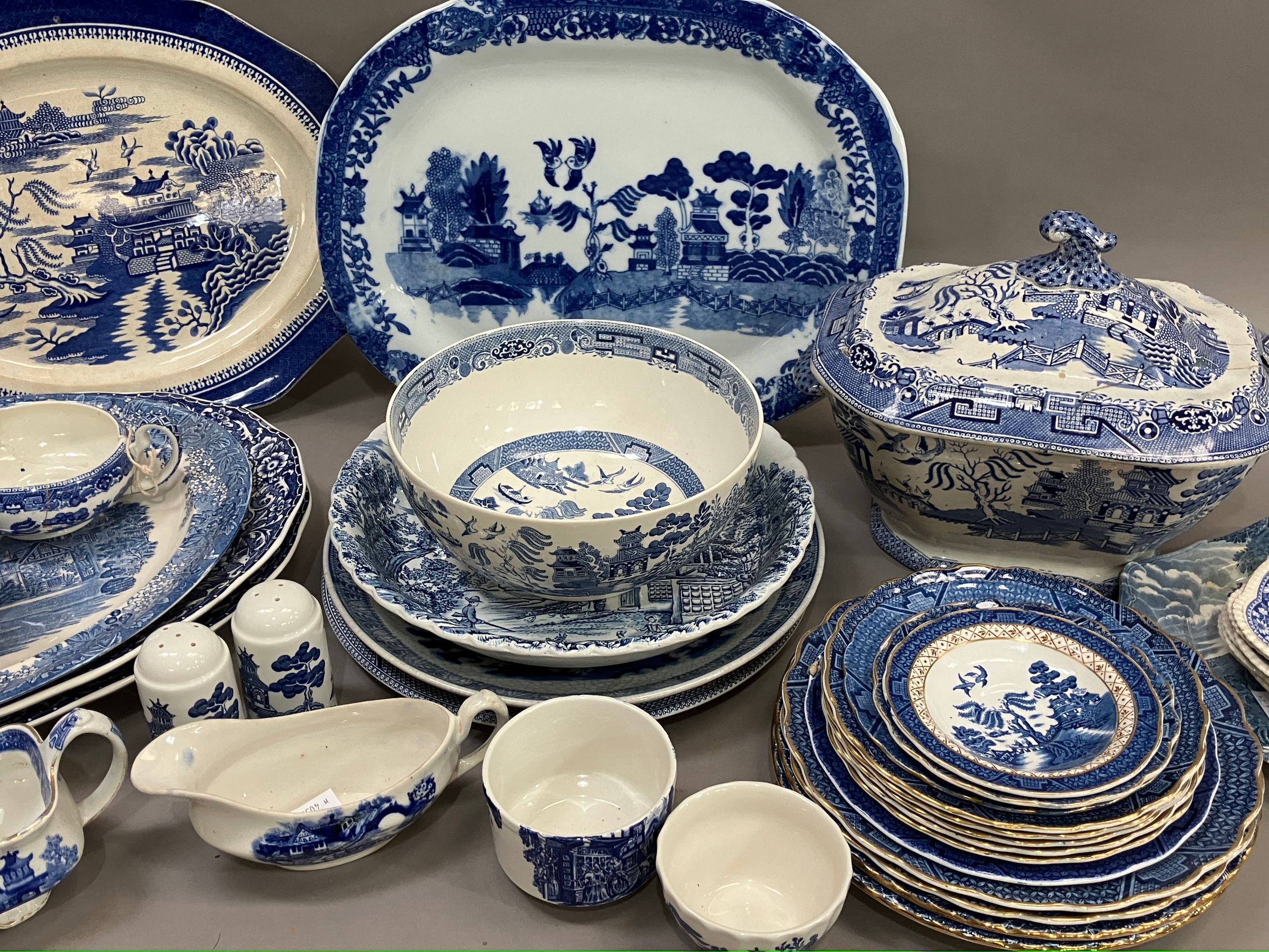 A 19th century lidded willow pattern blue and white tureen with finial, together with other blue and - Image 3 of 3