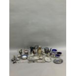 A collection of silver plated ware including coffee pot, hot water pot, pierced basket with swing