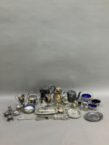 A collection of silver plated ware including coffee pot, hot water pot, pierced basket with swing