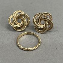 A pair of ear studs in 9ct gold each of four interlocked rings with twisted wire surrounds on