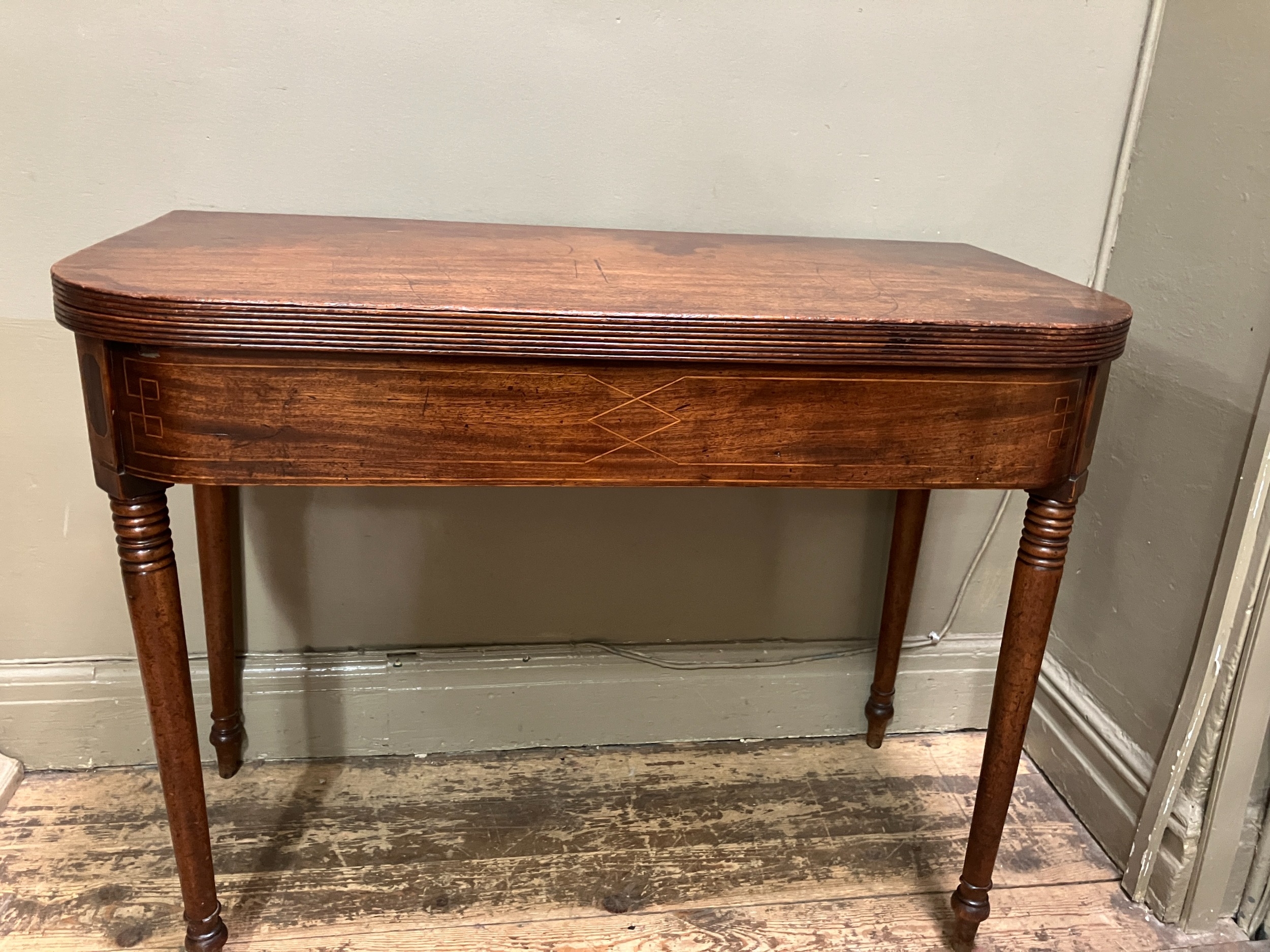 A 19th century mahogany tea table, rectangular having a fold over top with boxwood inlay to the - Image 2 of 5