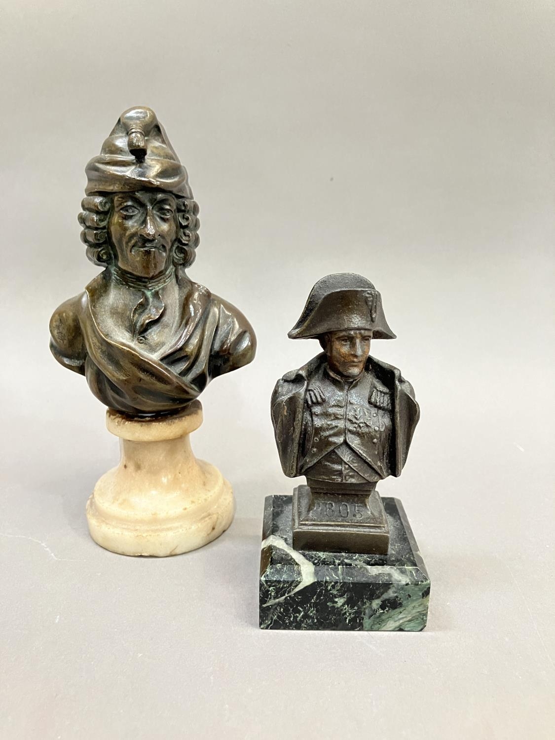 A bronze bust of Voltaire on a swept marble base, 15cm high together with a metal bust bust of - Image 2 of 4