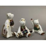 Three Royal Crown Derby teddy bears, Christmas bear with cracker, bear with carrier bag and seated