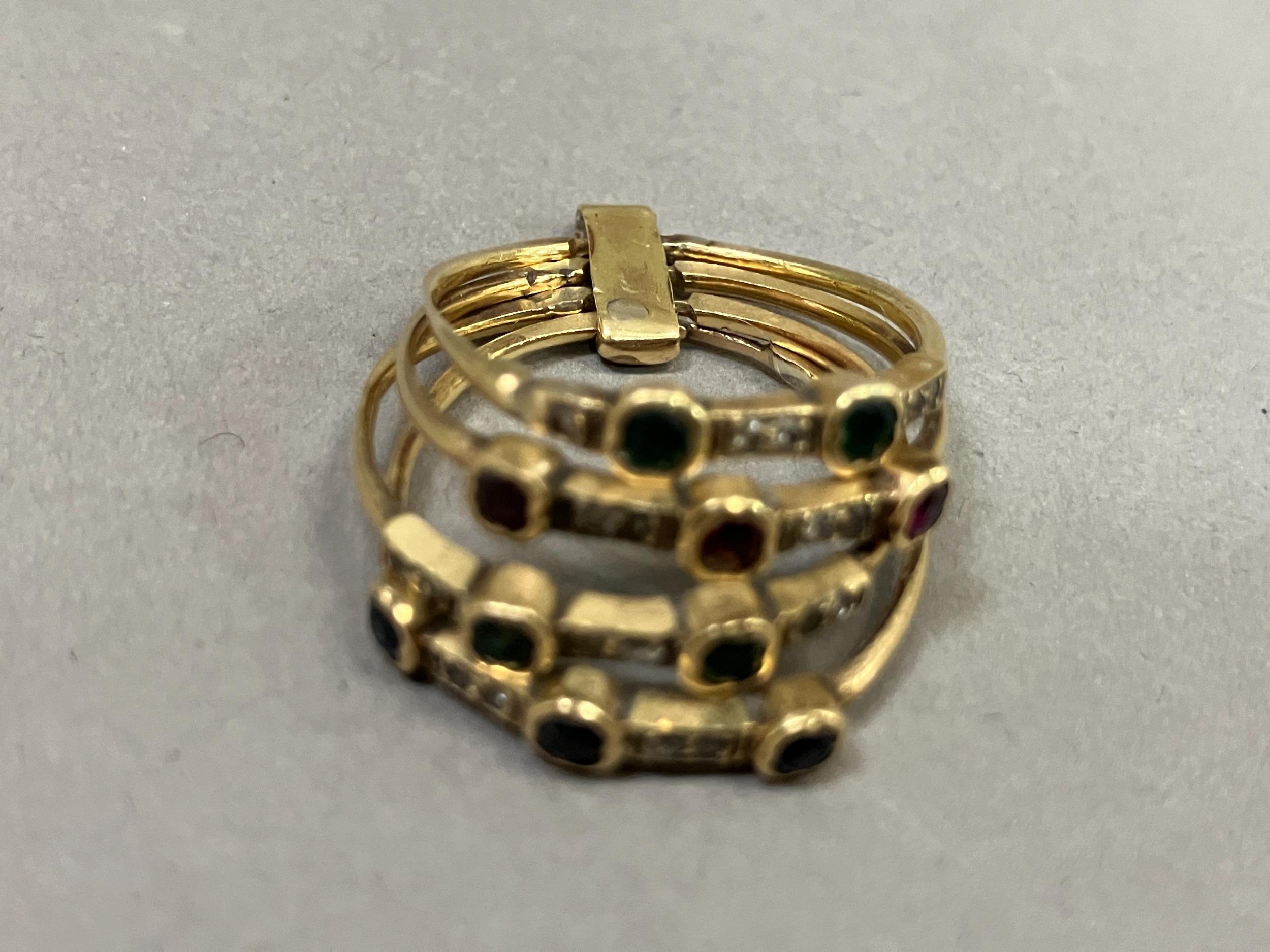 A sapphire, ruby, emerald and diamond Harem ring circa 1950 in 14ct gold, each of the four - Image 3 of 4