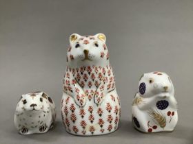 A Royal Crown Derby paperweight bear together with a harvest mouse and a bank vole, exclusive for