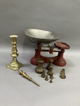 A pair of vintage weighing scales with pan together with a Victorian brass baluster candlestick