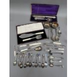 A small collection of late 19th and early 20th Century silver plated cutlery including two boxed