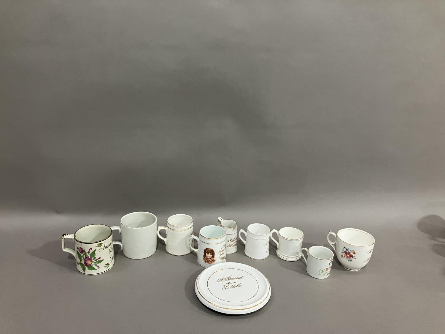 A collection of 19th and early 20th century named mugs, jugs and teapot stand, some souvenirs from - Image 3 of 4