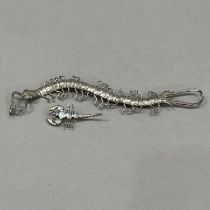An early to mid 20th century centipede brooch (at fault) in .800 silver in full relief, set to the
