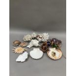 A collection of seashells, coral, green, blue and brown glass floats, amethyst sample etc