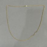 A neck chain in 9ct gold facetted marine curb links, approximate length 64mm, approximate weight 9g