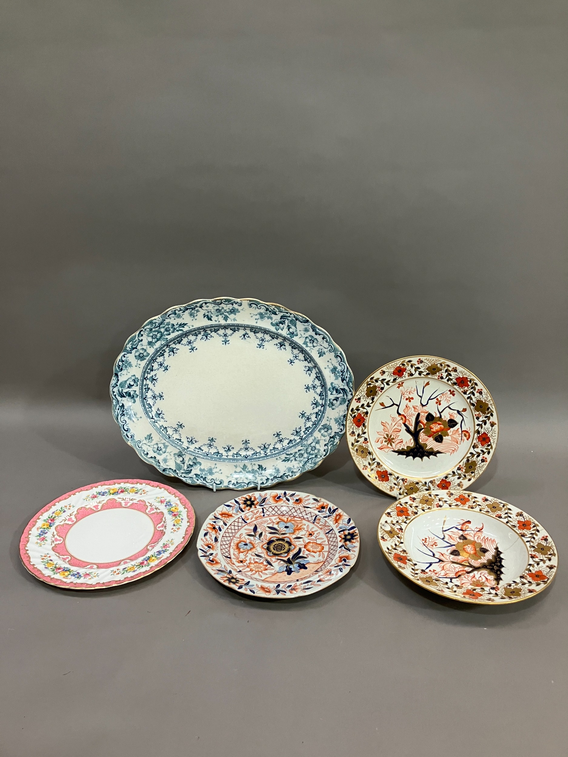 Three early Royal Crown Derby Imari pattern plates, a Royal Crown Staffordshire posy plate