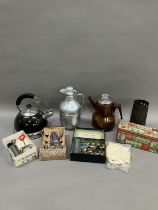 A collection of vintage kitchenalia comprising a brown coffee percolator, an Acme grater, a stove