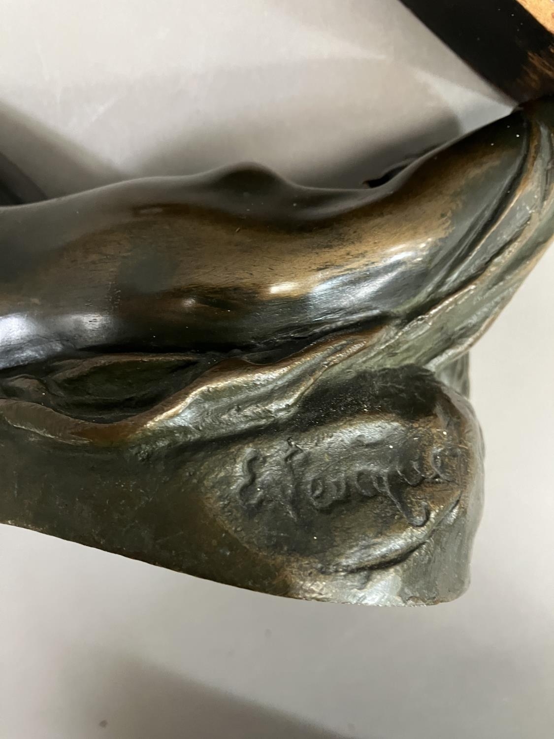 A cast bronze model of a nude woman reclining, indistinctly signed on base 26cm long - Image 5 of 5