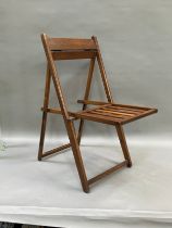 A 1930/40s oak folding chair with slatted seat