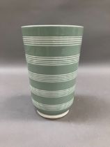 A Keith Murray for Wedgwood celadon green and cream vase of slightly tapered cylindrical form