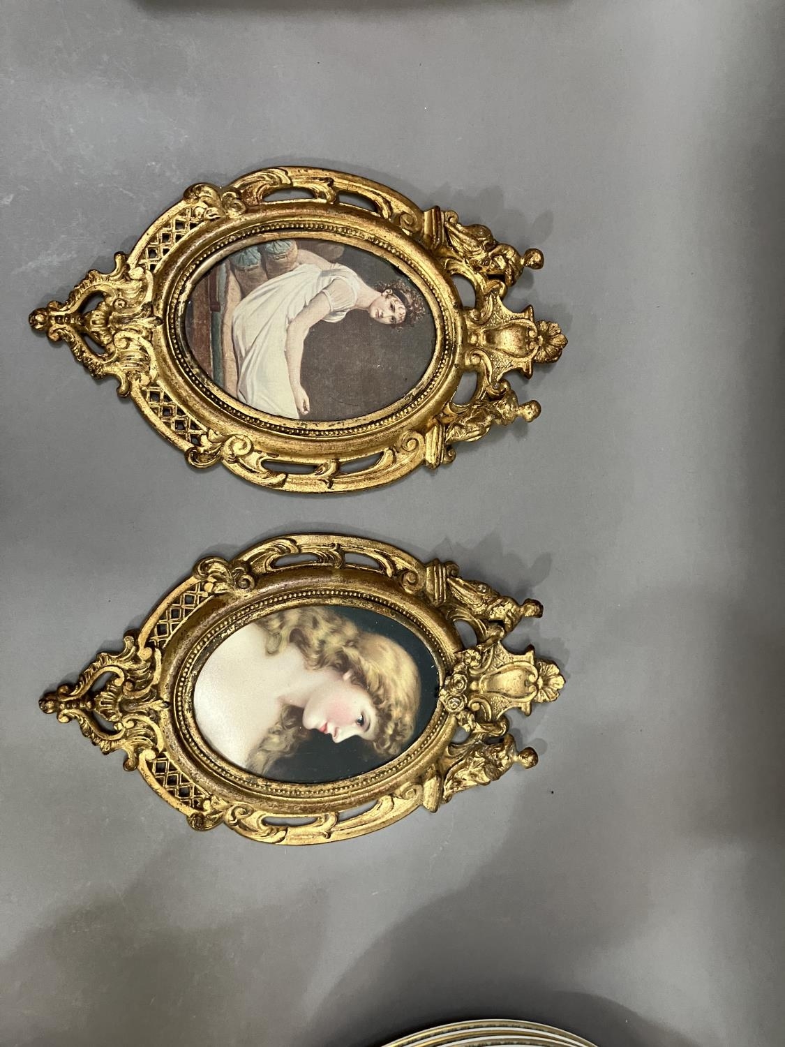A pair of gilt metal wall hanging picture frames having pierced and moulded decoration, the pediment - Image 2 of 2