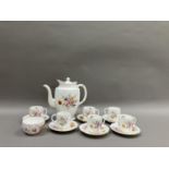 A Royal Crown Derby, Derby Posies pattern coffee service for six comprising coffee pot, sugar