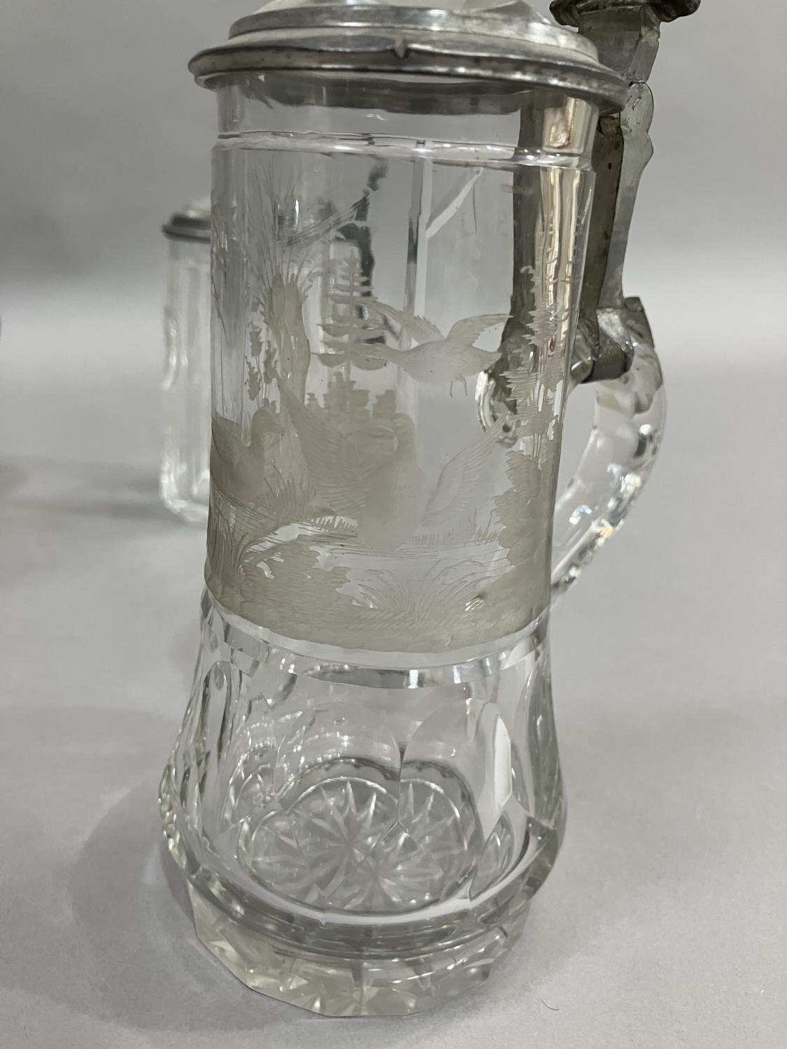 Three cut glass and pewter mounted tankards, one etched with water fowl in a river landscape with - Image 4 of 7