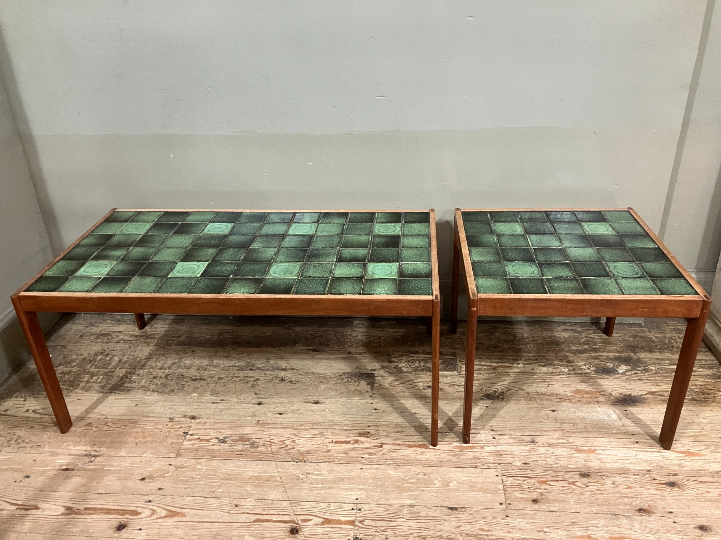 Two late 1960s tile topped tables with teak frames, the tiles possibly Hornsea pottery, 98cm x