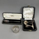 A boxed composite set of Queen Elizabeth II silver spoon and pusher Sheffield 1955 for Viners