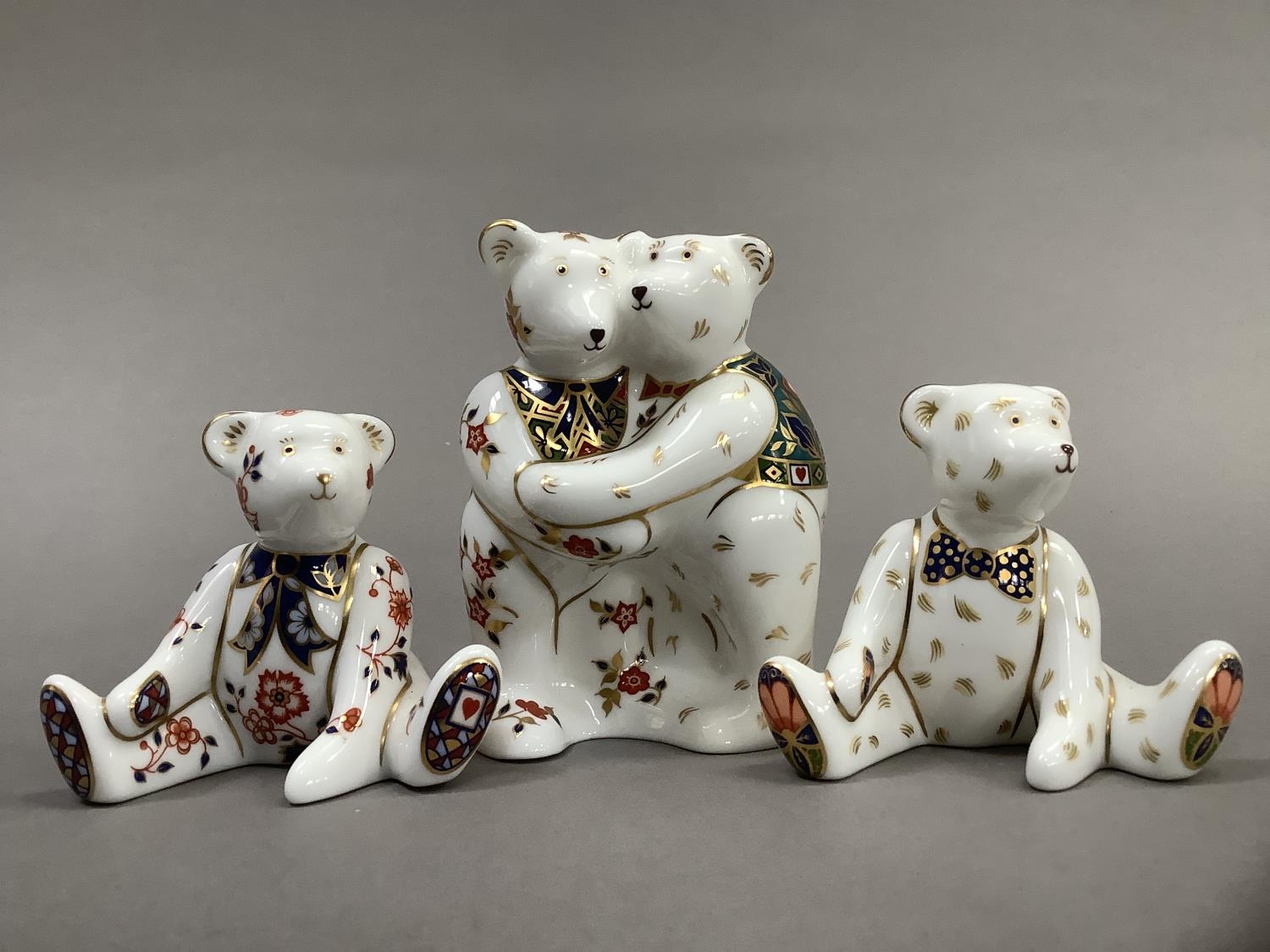 A Royal Crown Derby model of two bears hugging together with two seated bears, 9cm and 6.5cm - Image 2 of 4