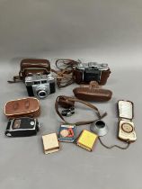 Cameras including Zeiss Icon Nettar SLR with carry case, a Zeiss Icon Calora SLR with carry case