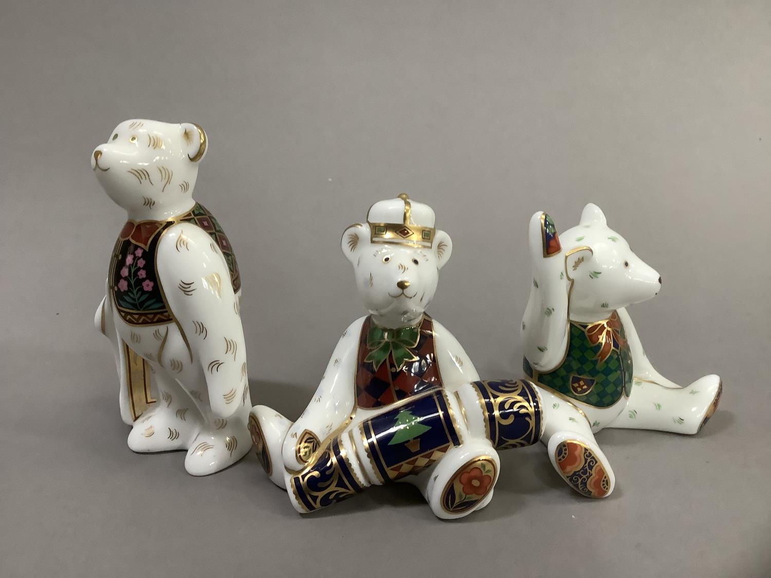 Three Royal Crown Derby teddy bears, Christmas bear with cracker, bear with carrier bag and seated - Image 2 of 4