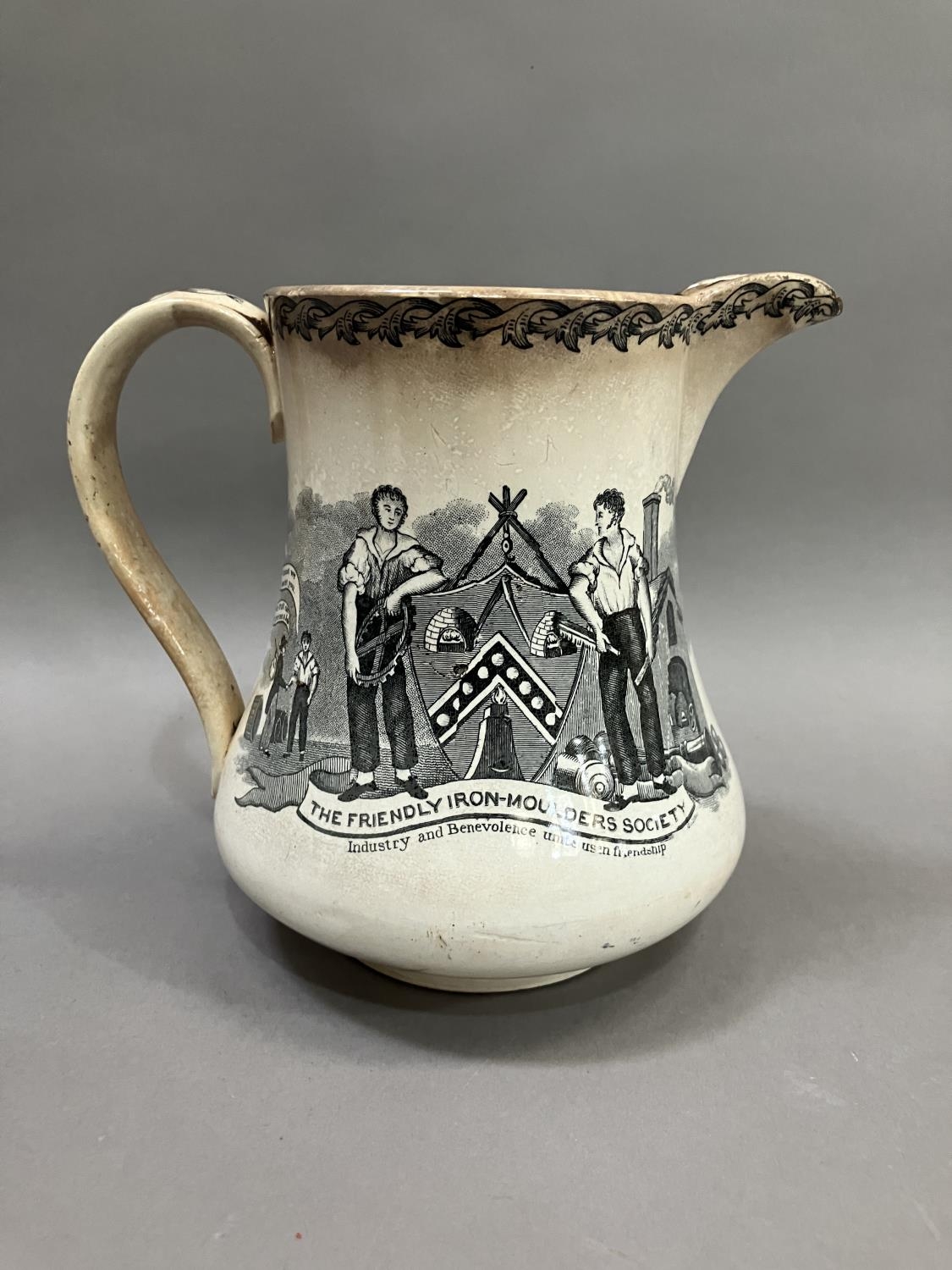 A 19th century pottery jug transfer printed with the Friendly Iron Moulders Society, figures and