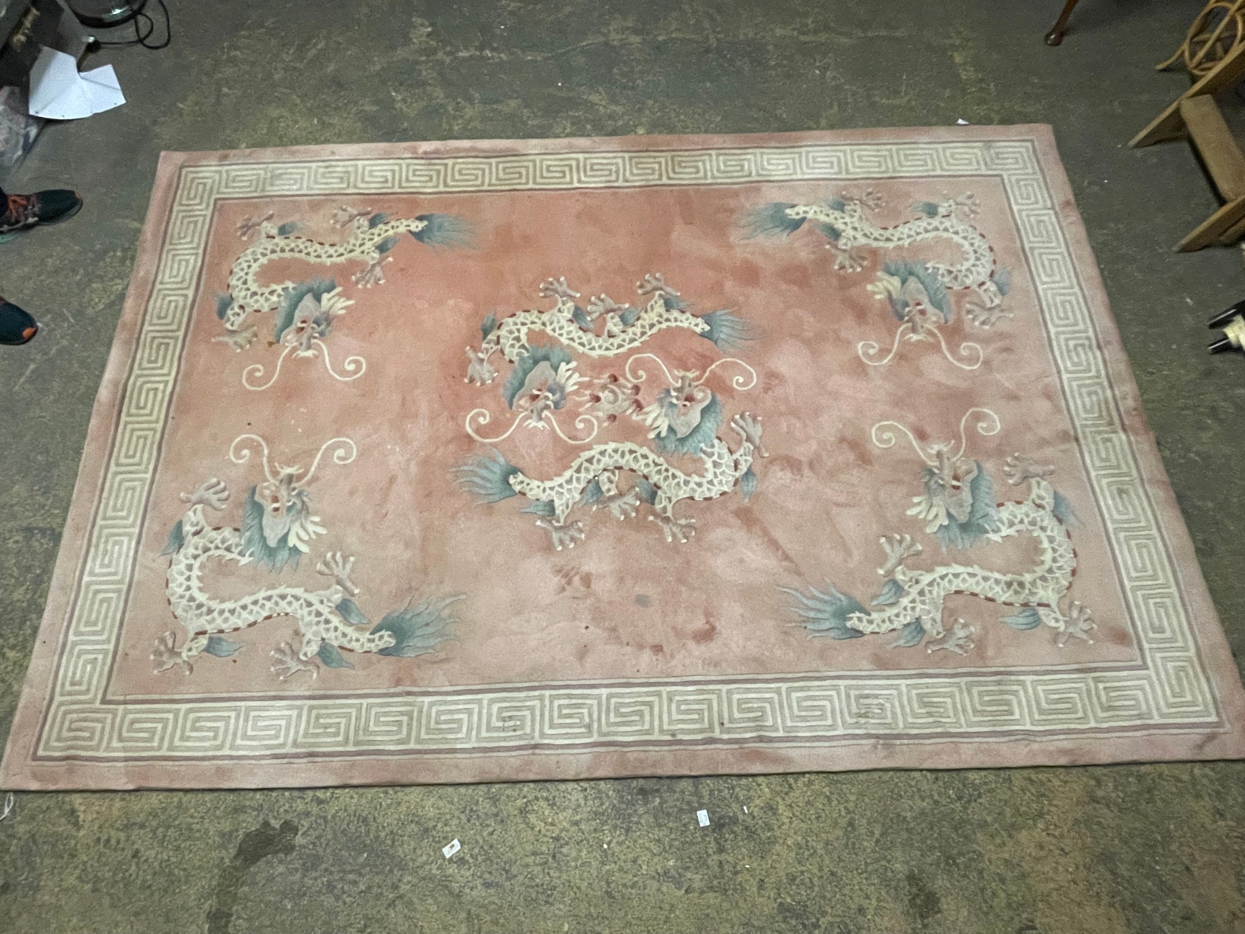 A Chinese pink rug bearing motifs of dragons in a geometric border - Image 2 of 5