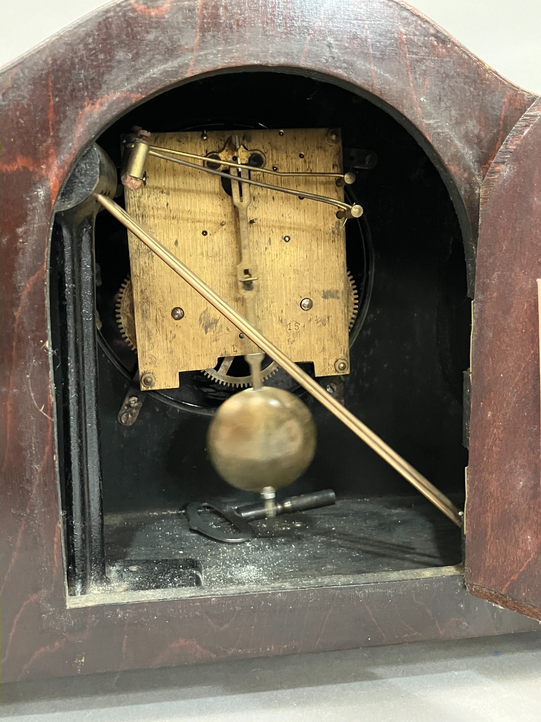 An early 20th century mahogany and inlaid mantel clock having silvered dial with black Arabic - Image 3 of 3