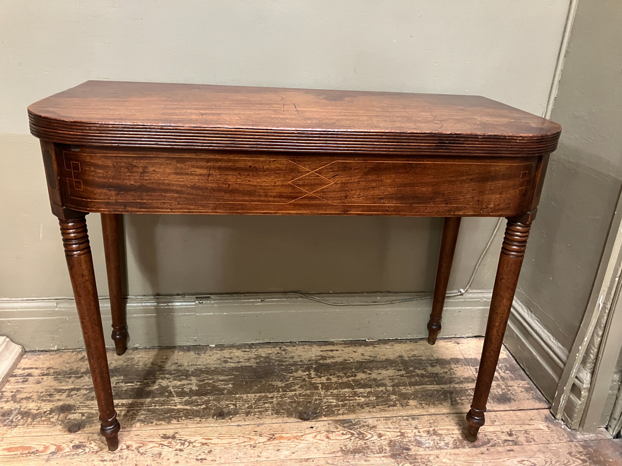 A 19th century mahogany tea table, rectangular having a fold over top with boxwood inlay to the - Image 3 of 5