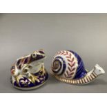 A Royal Crown Derby paperweight snail and a frog with gold button, 7cm and 7.5cm high