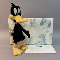 A Steiff mohair plush figure of Warner Bros Cartoon’s ‘Daffy Duck’, number 527 of 2000, 35cm high,