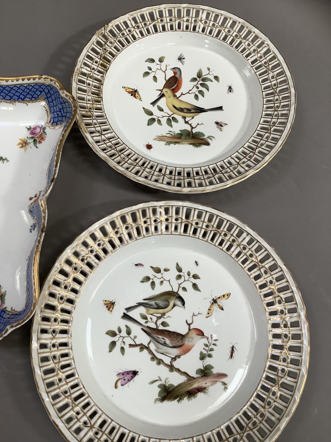 A pair of 19th century Meissen porcelain plates, polychrome painted with birds perched on leafy - Image 3 of 6