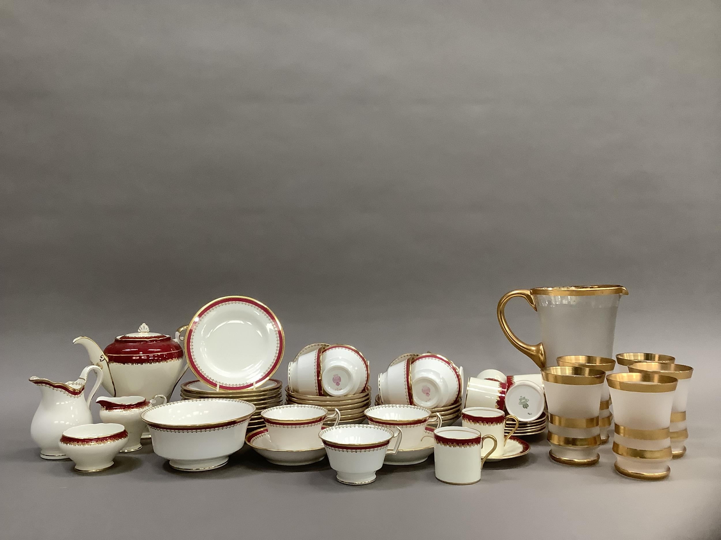 A Minton china tea service bordered in pink and gilt comprising teapot, sugar and milk, eleven cups, - Image 2 of 5