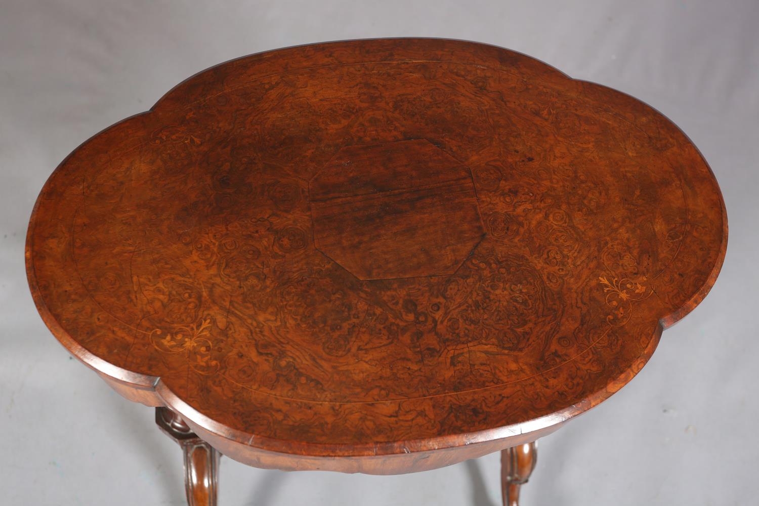 A Victorian figured walnut work table of quatrefoil outline, quarter veneered with central panel, - Image 7 of 7