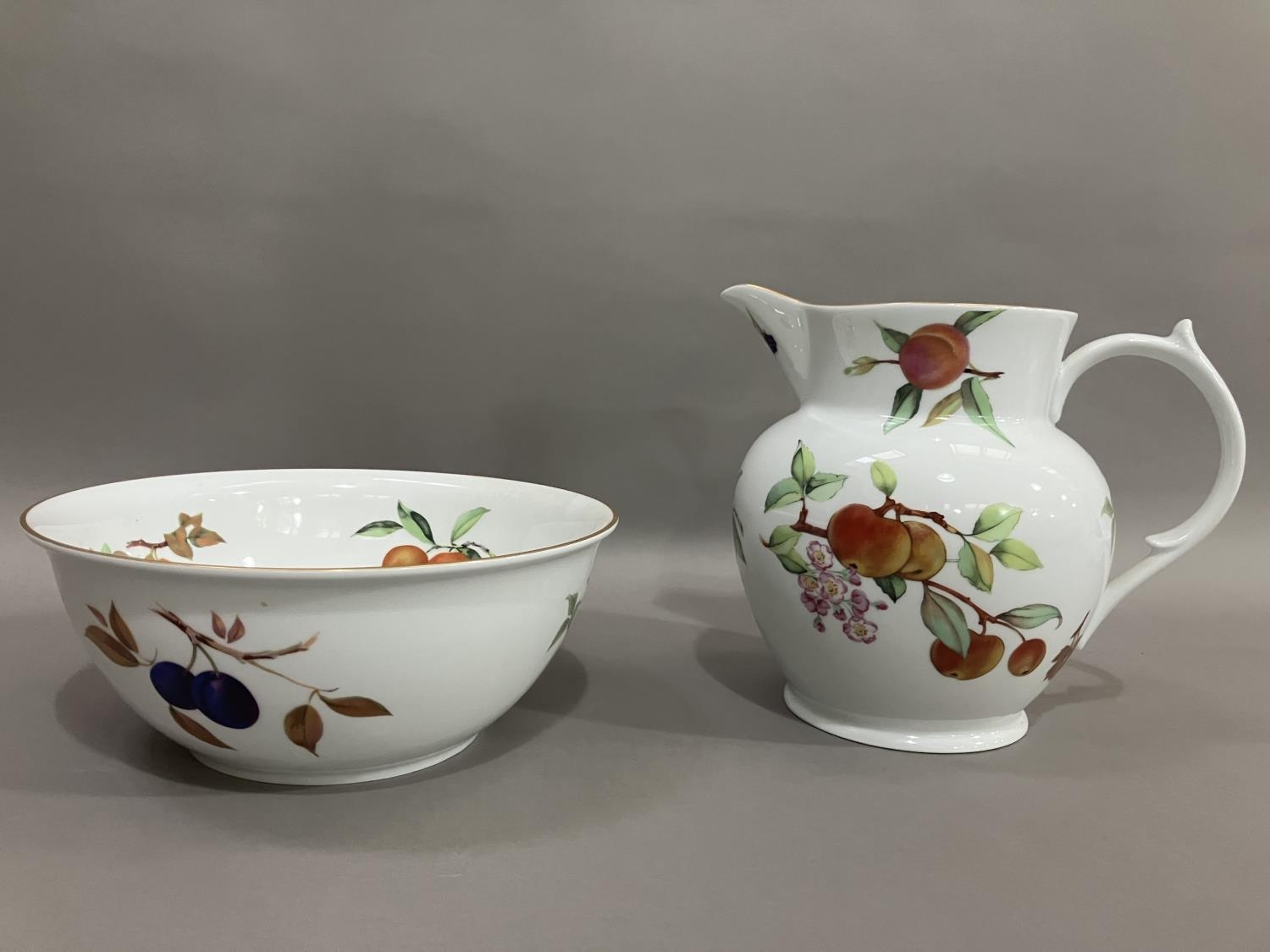 A Royal Worcester Evesham gold toilet jug and bowl