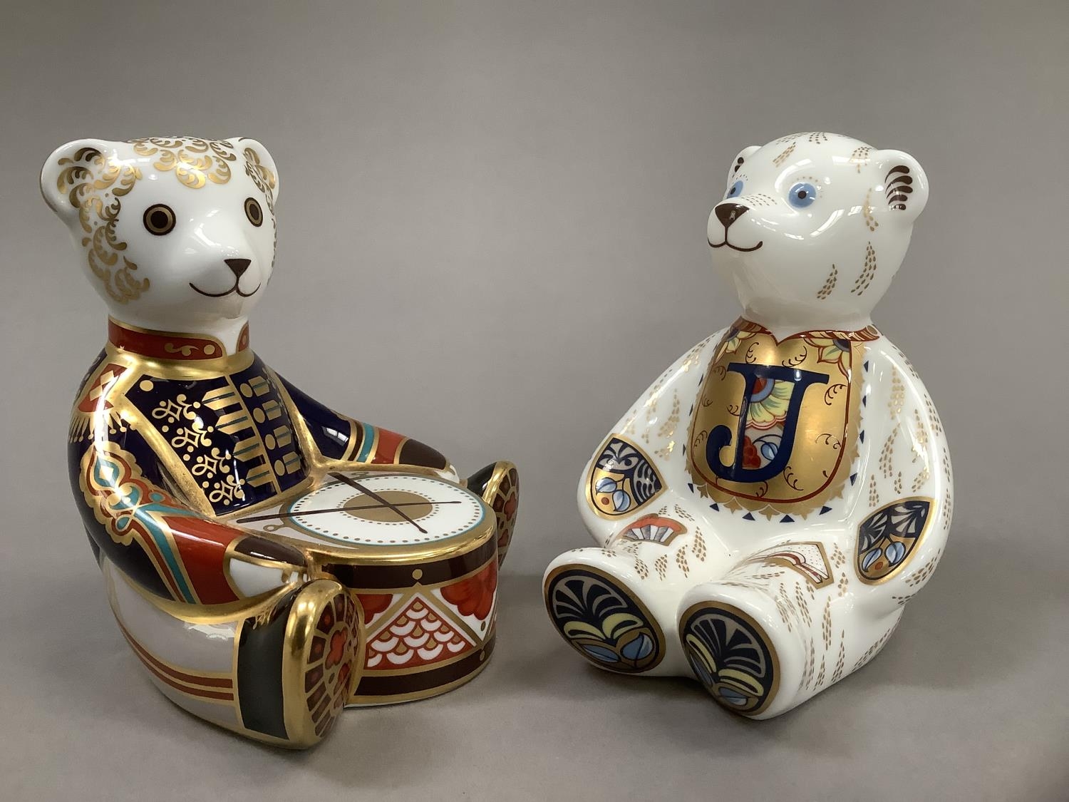 A Royal Crown Derby alphabet bear, gold button, together with drummer bear, 10.5cm and 10cm high - Image 2 of 4