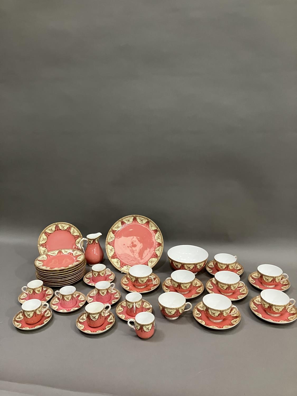 A Royal Worcester tea and coffee service of salmon pink ground over pale yellow printed with foliate - Image 2 of 3