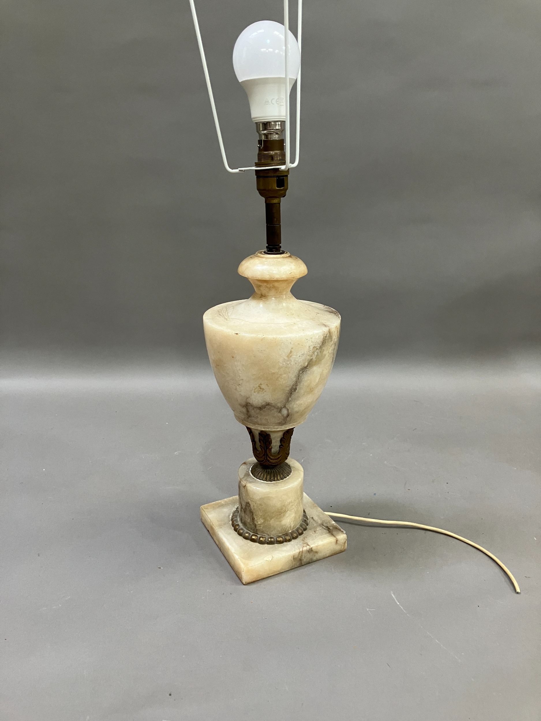 A gilt metal mounted alabaster table lamp of urn form on a square base, complete with shade, 42. - Image 2 of 4