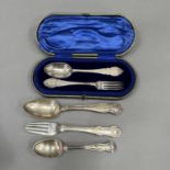 A boxed pair of Edward VII christening spoon and fork, Sheffield 1916 and 1911 from CW Fletcher &