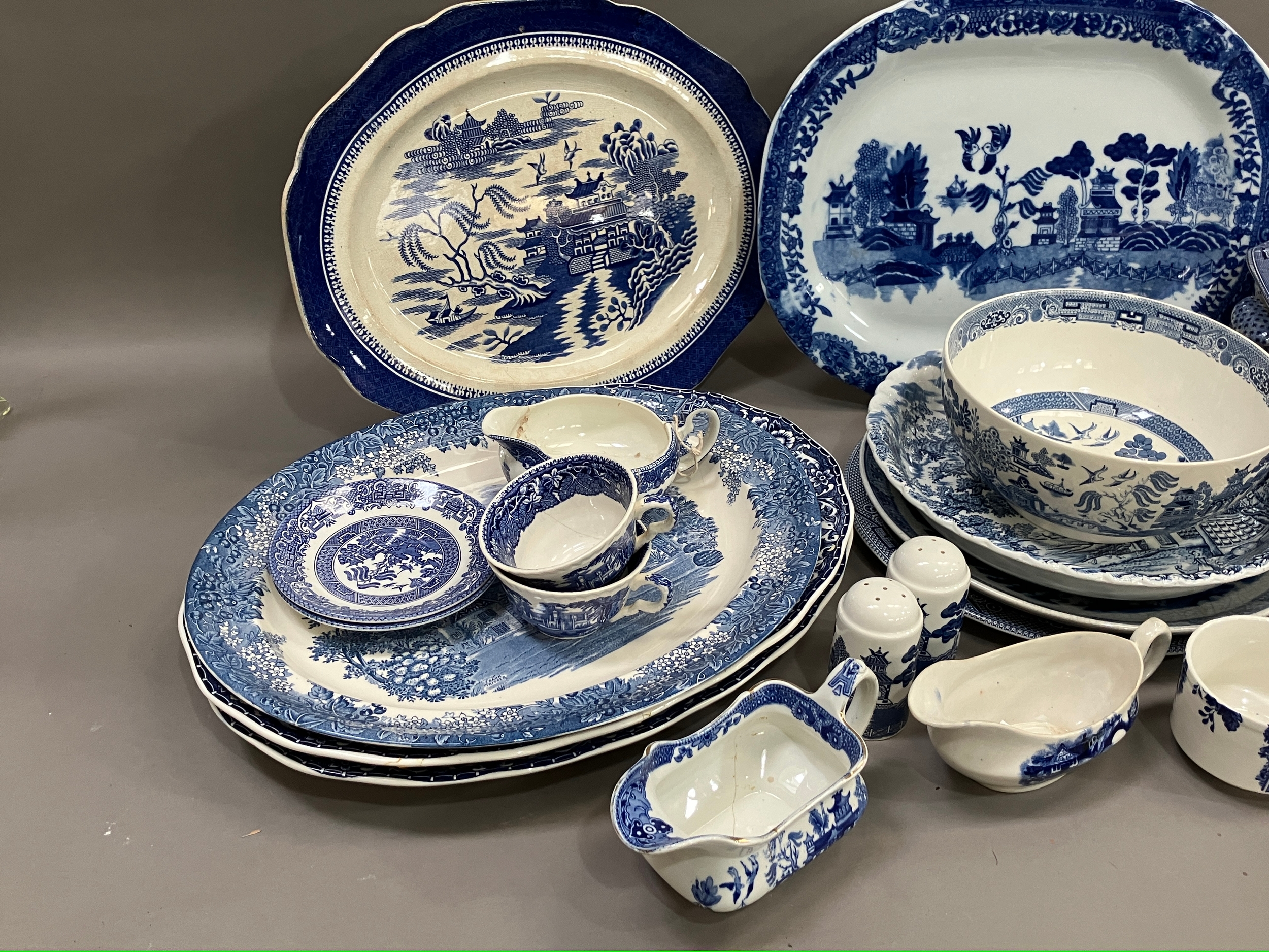 A 19th century lidded willow pattern blue and white tureen with finial, together with other blue and - Image 2 of 3