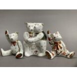 A group of Royal Crown Derby teddy bears including two bears hugging with year 2010 and two seated