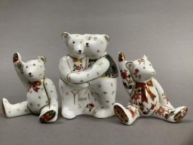A group of Royal Crown Derby teddy bears including two bears hugging with year 2010 and two seated