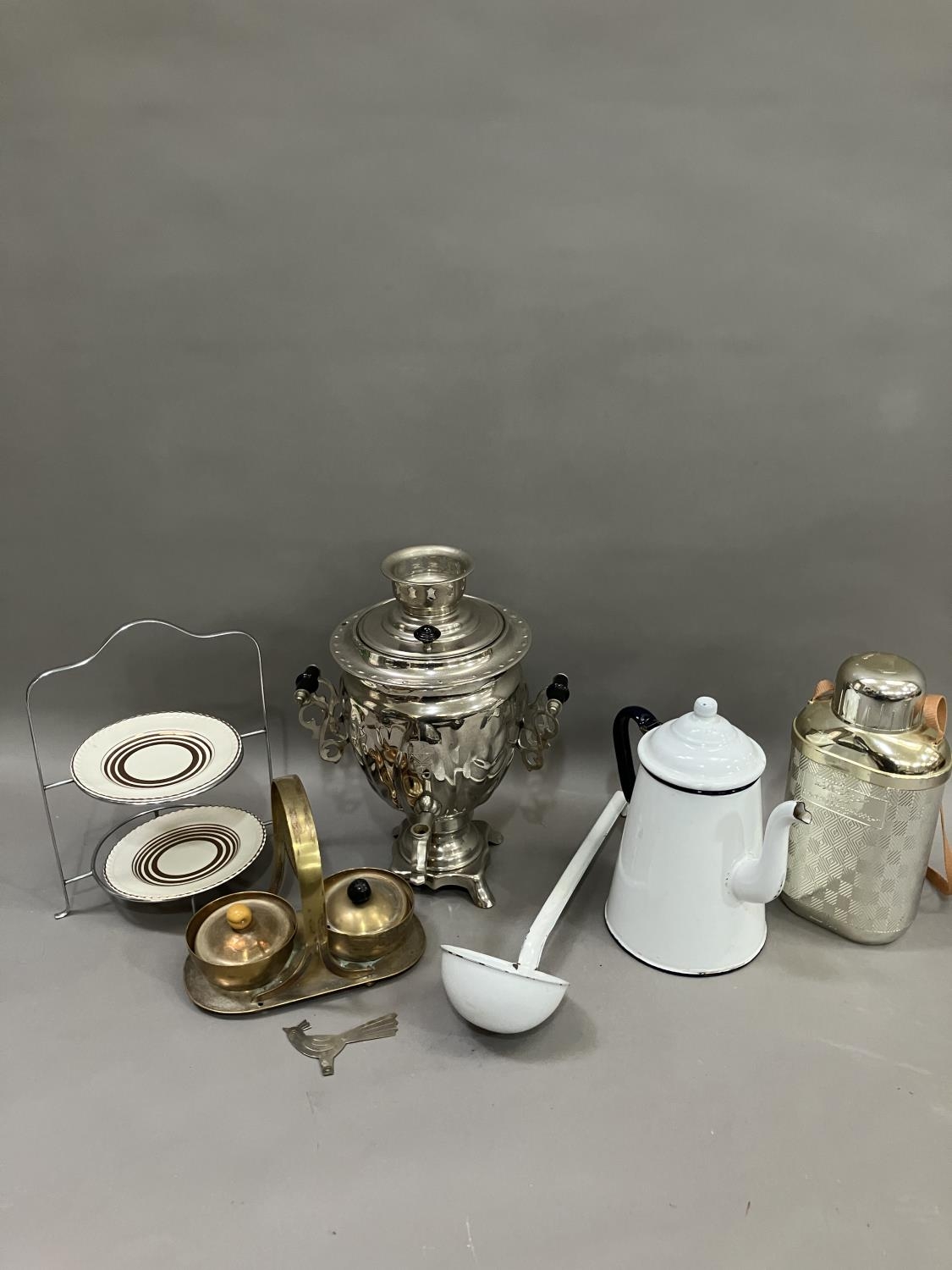A collection of vintage kitchenalia including an enamel ware coffee pot, enamel ware ladle, silver