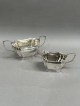 A pair of George V silver cream jug and silver sugar bowl, Sheffield 1914 for R F Mosley and Co,